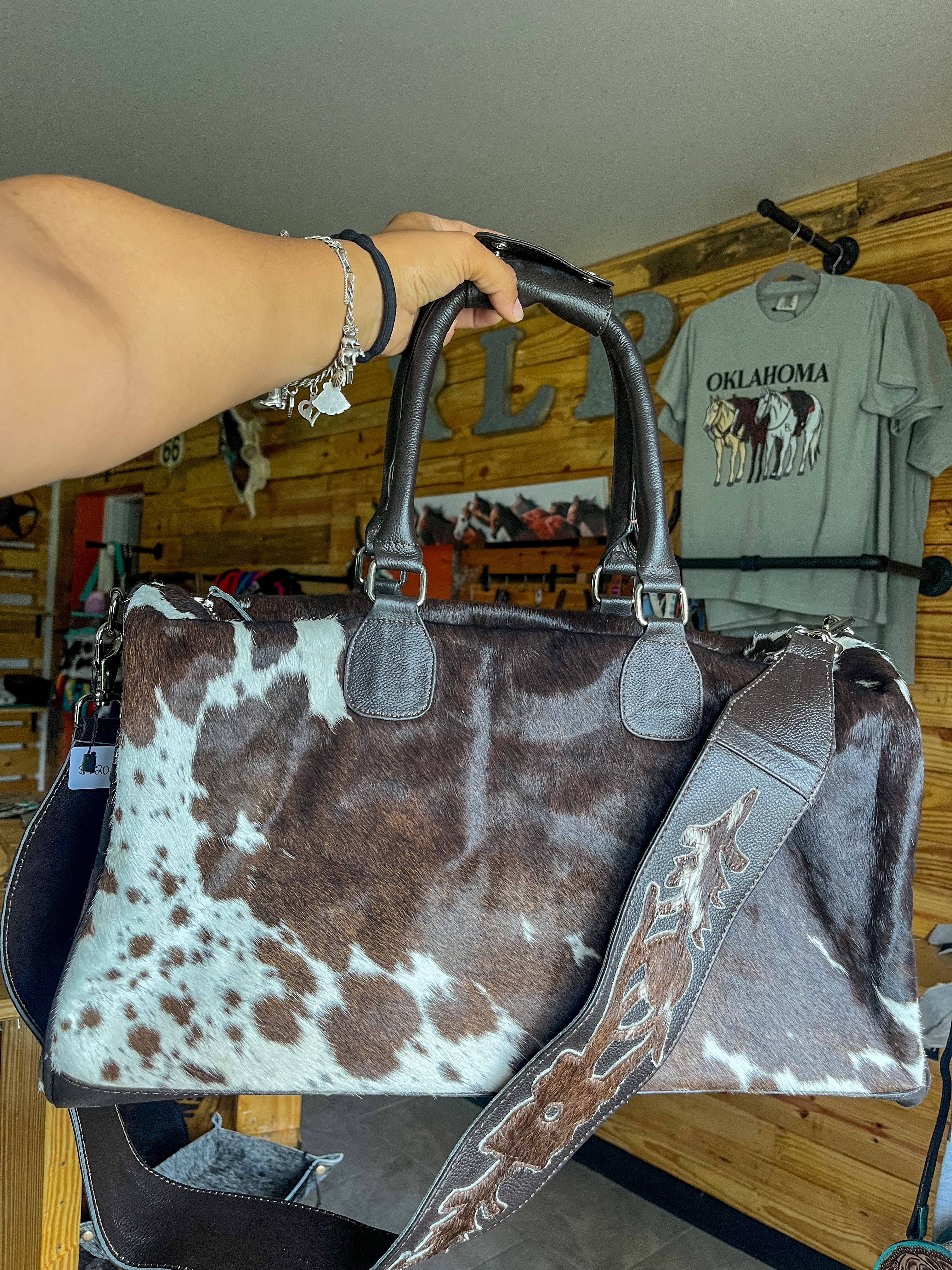 Cowhide offers Purse/Small Duffel Bag